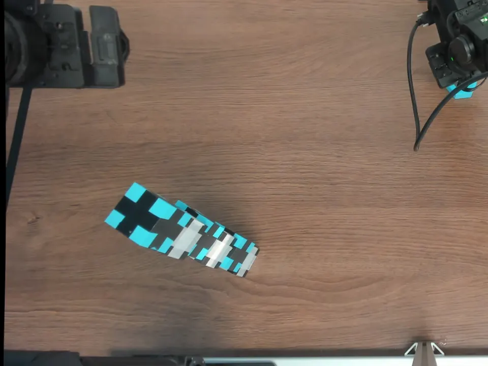 Overhead photograph of a completed six-cube tower.
